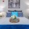 a bed with blue and white pillows