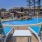 a pool with chairs around it