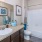 a bathroom with a marble countertop