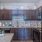a kitchen with black appliances