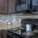 a kitchen with a stove and oven