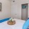 a bed with a blue blanket
