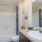 a bathroom with a sink and a shower