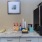 a counter top with a tv and other objects on it