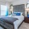 a bedroom with a large bed